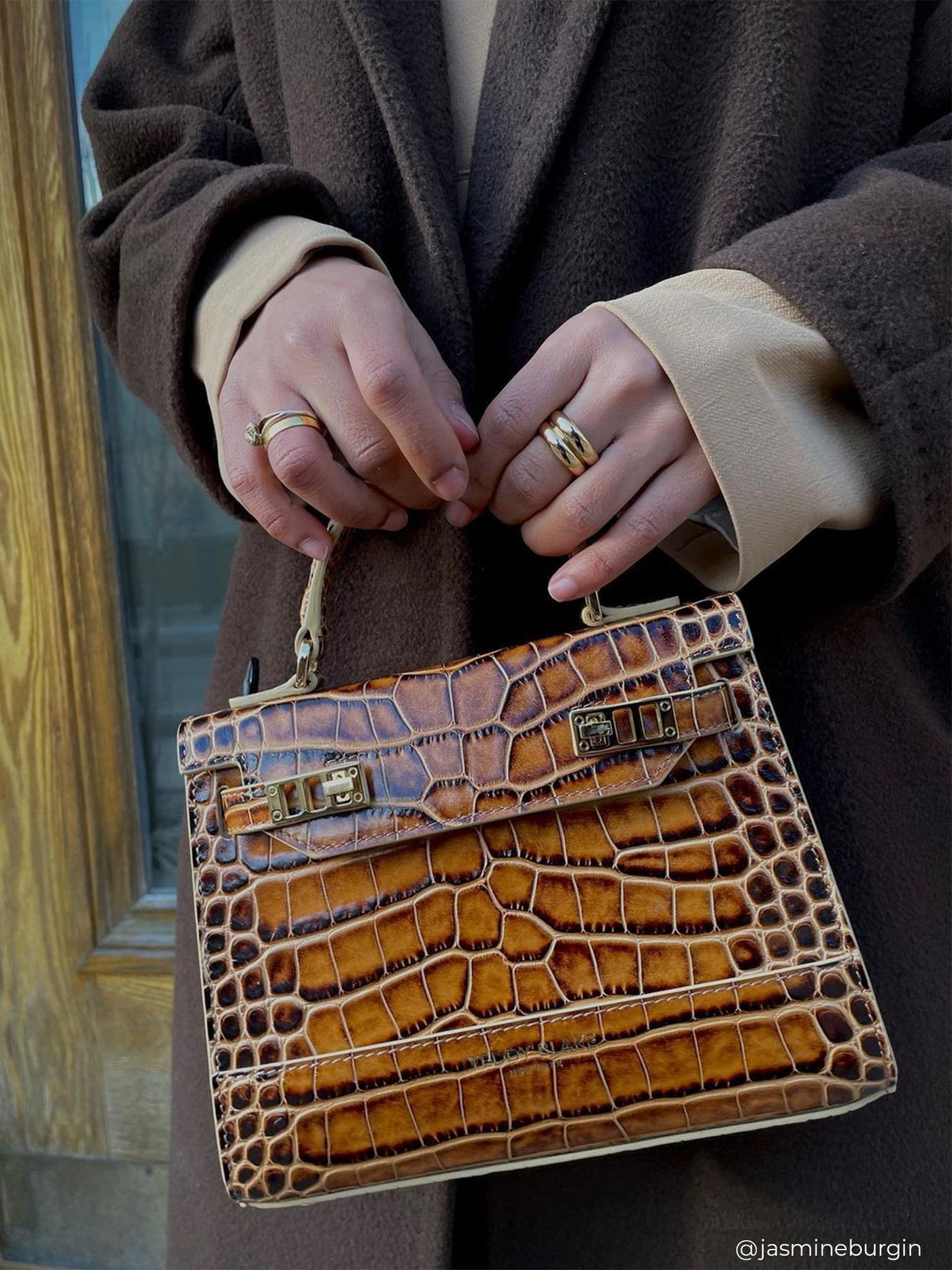HERMES. Bag in grained leather Togo brown. Model TSAKO. …